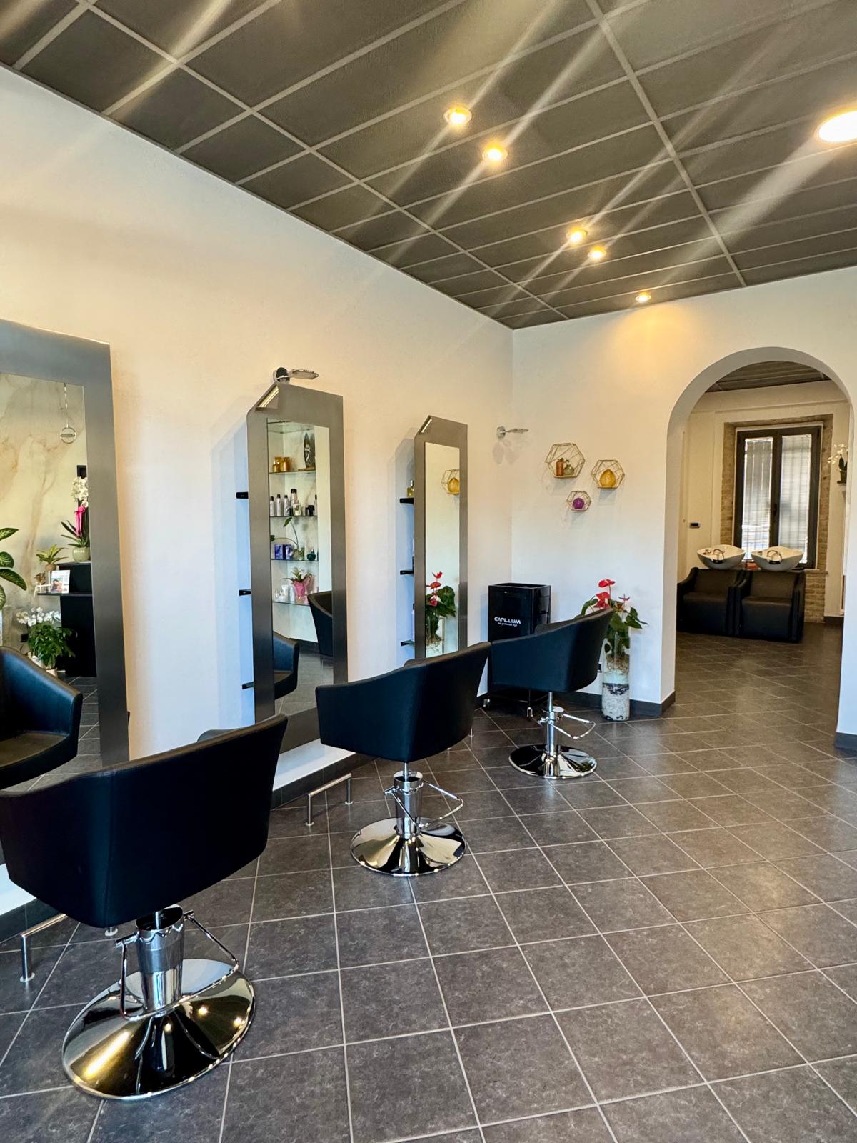 Professional hairstylist working in luxury salon